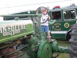 children enjoy playing wuth the old john deer equipment.JPG
